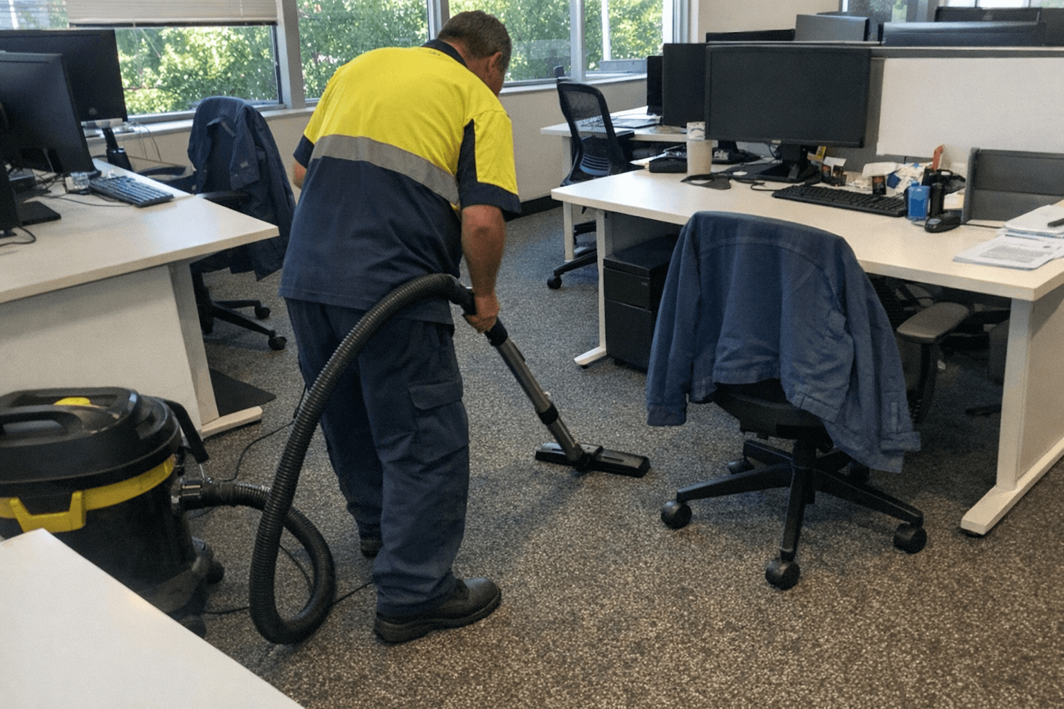 Vacuuming office carpet